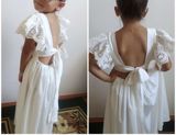 Uşaq üçün ağ rəngli zərif don - Model: arxası dərin açıq kəsimli — Cama