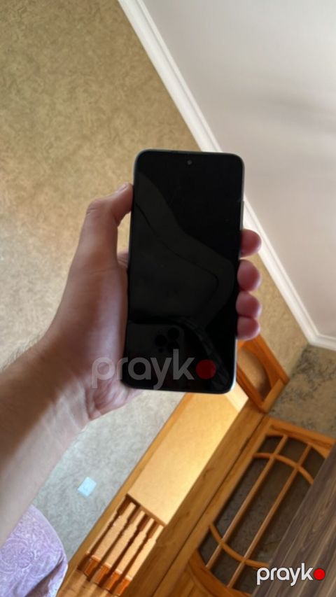 Xiaomi Redmi smartfon - Model: Redmi (arxa paneldə “Redmi” loqosu — Digah