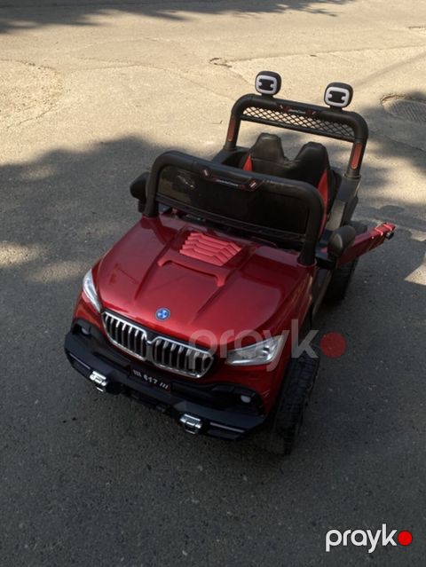 Uşaqlar üçün elektrikli minik maşını – qırmızı rəngdə off-road — Bakı