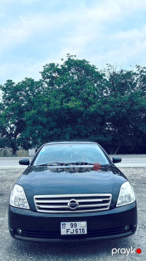 Nissan Teana sedan - Kuzov: qara rəng, geniş salon, xrom ön — Quba