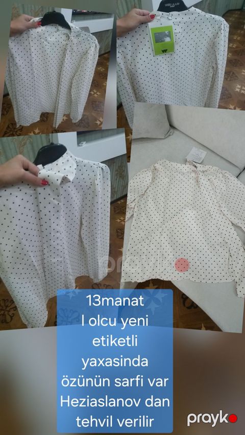 Ağ rəngli, qara xallı qadın köynəyi/bluz. Zərif və klassik görünüşə — Bakı