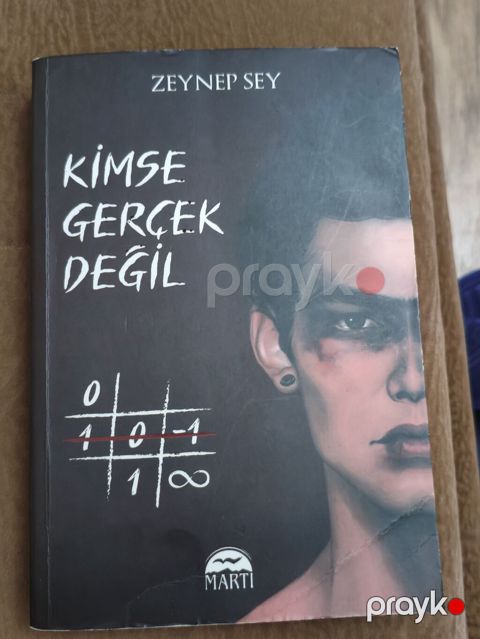 Məhsul: Kitab – “Kimse Gerçek Değil” Müəllif: Zeynep Sey Nəşriyyat — Bakı