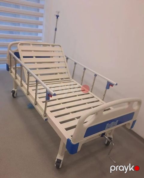 İki funksiyalı tibbi çarpayı - Mexaniki idarəetmə: ön hissədəki qol
