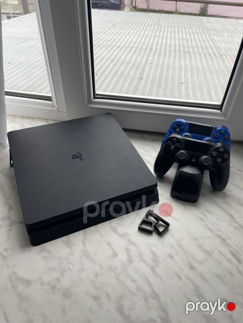 PlayStation 4 Slim Xüsusiyyətlər: - PS4 Slim korpusu, kompakt və — Quba