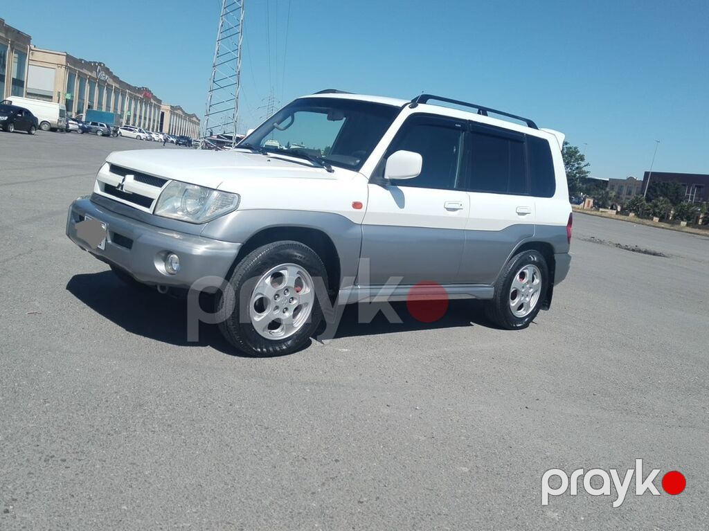 Mitsubishi Pajero iO 4WD kompakt yolsuzluq avtomobili. Avtomobilin — Avtomobillər, Gəncə (9)
