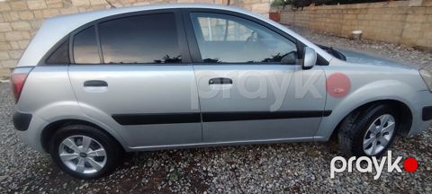 Kia Rio hatchback - Gümüş rəngli kuzov, 5 qapı - Mexaniki sürətlər — Quba