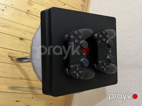 PlayStation 4 Slim oyun konsolu + 2 ədəd DualShock 4 pultu - Model — Xırdalan