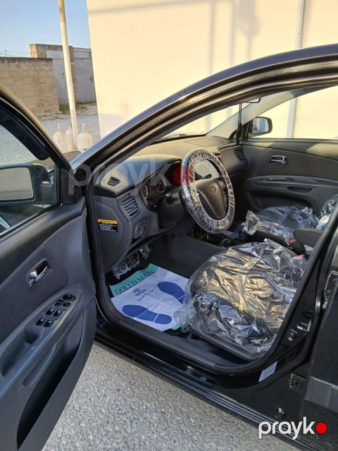 Kia Rio CRDi, qara rəng, hetçbek .maşin arxa sağ qapıdan başqa — Bakı