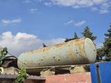 Metaldan hazırlanmış iri həcmli silindrik su/Maye saxlancları üçün çən — Оборудование для полива, водоотвод и дренаж
