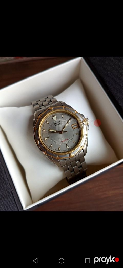 Orient Mechanical Titanium qol saatı - Korpus və qolbaq: titan — Gəncə