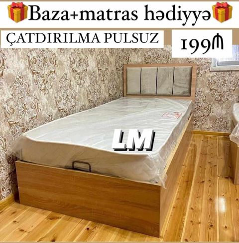 Taxta çərçivəli tək nəfərlik çarpayı — yumşaq başlıqla. Baza açılan — Çarpayılar