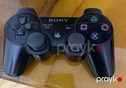 Sony PlayStation 3 (PS3) Super Slim konsolu və DualShock 3 oyun pultu — Bakı