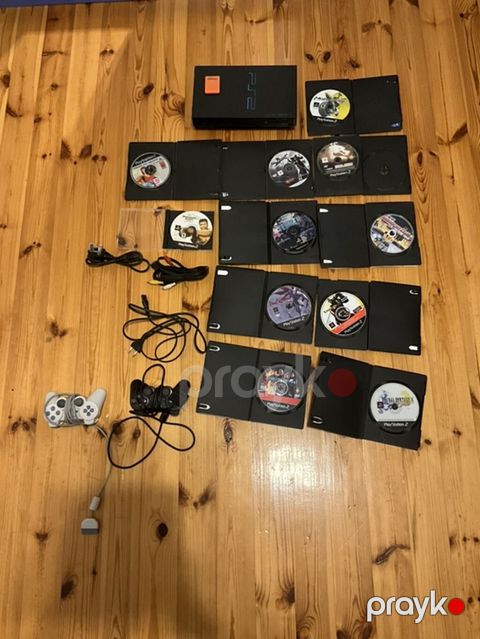 PlayStation 2 (PS2) oyun konsolu komplekt Paketə daxildir: - PS2 — Bakı
