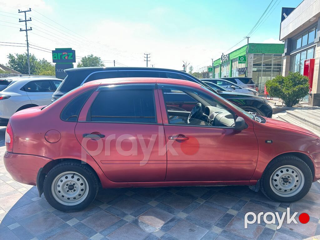 Lada Kalina sedan – qırmızı rəng, 4 qapı, ön ötürücülü. Şəhər üçün — Avtomobillər, Bakı (4)
