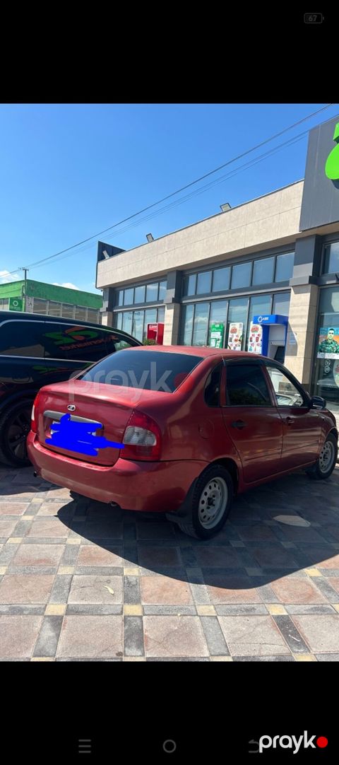 Lada Kalina sedan – qırmızı rəng, 4 qapı, ön ötürücülü. Şəhər üçün — Bakı