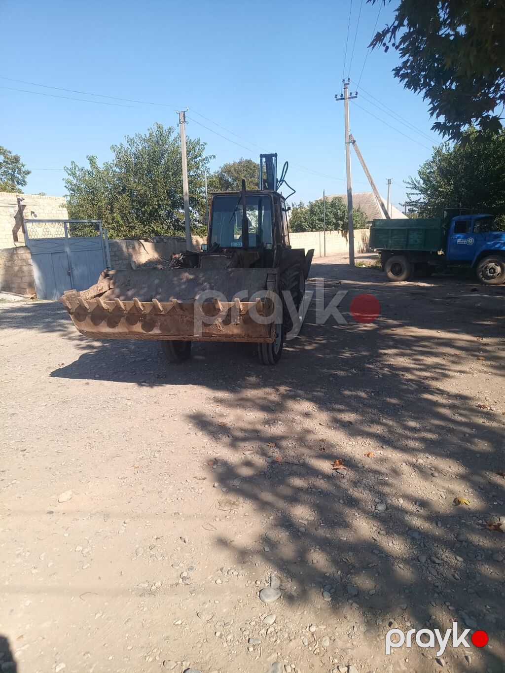 Ekskavator-yükləyici traktor - Ön hissədə iri yükləmə kovası, arxa — Ekskavatorlar, Samux (10)