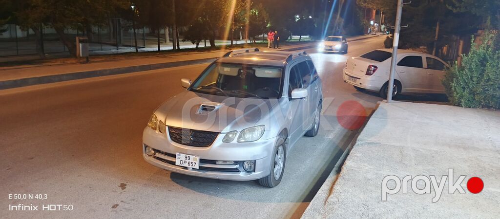 Mitsubishi Airtrek, gümüşü rəng, universal kuzov. Xarici — Avtomobillər, Bakı (2)