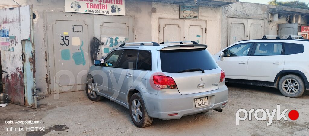 Mitsubishi Airtrek, gümüşü rəng, universal kuzov. Xarici — Avtomobillər, Bakı (6)