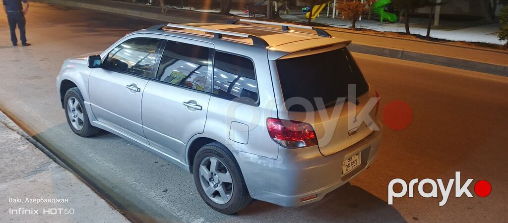 Mitsubishi Airtrek, gümüşü rəng, universal kuzov. Xarici — Avtomobillər, Bakı (4)