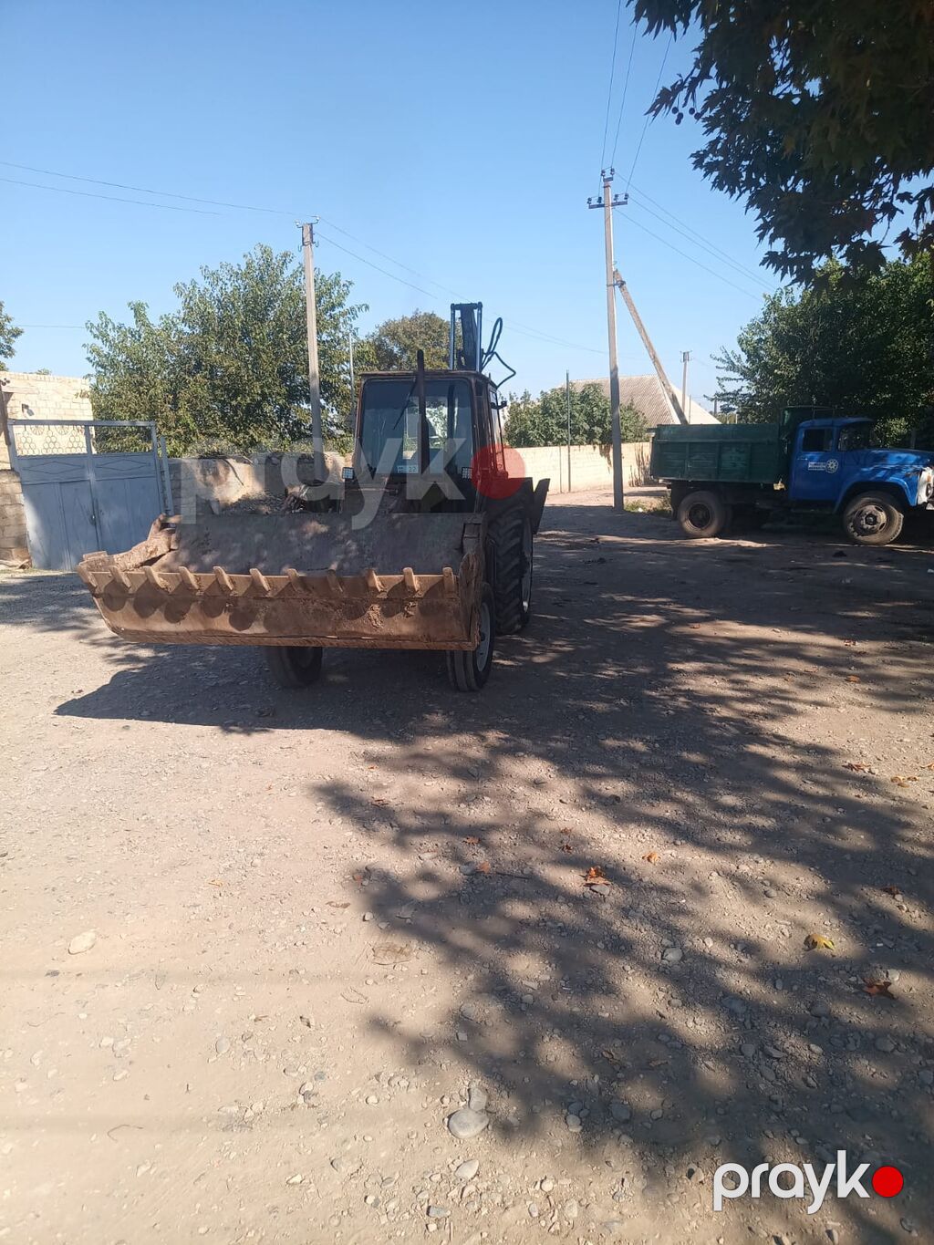 Ekskavator-yükləyici traktor - Ön hissədə iri yükləmə kovası, arxa — Ekskavatorlar, Samux (2)
