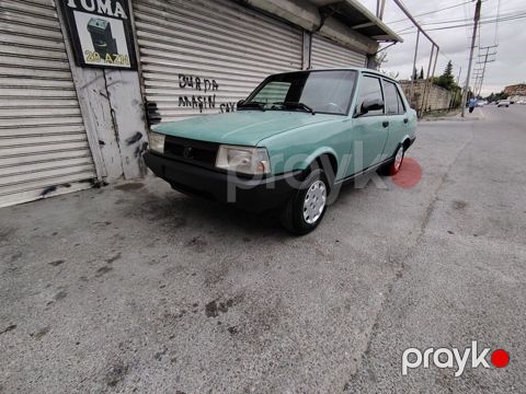 Model: Tofaş Şahin (sedan) Kuzov: 4 qapılı, açıq yaşıl rəng Yanacaq — Digah