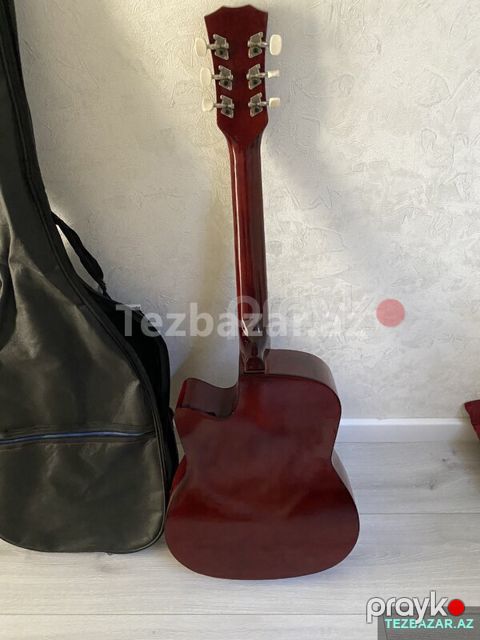 Qitar islenmis — Bakı