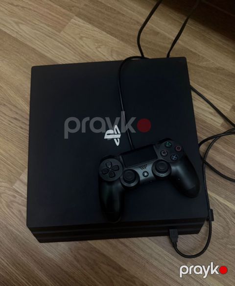 Ps 4 pro 1 Tb yaddas orginal pult uzerinden1 eded — Bakı
