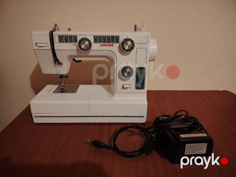 Janome tikiş maşını - Mexaniki idarəetmə, ön paneldə seçim çarxları — Qəbələ