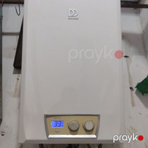 Kombi Dəmir Dokum 28 kw 2 esenjor 1 il rəsmi zəmanət — Bakı