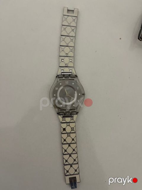 Zərif dizaynlı qol saatı - Brend: Swatch (siferblatda loqo görünür) — Bakı