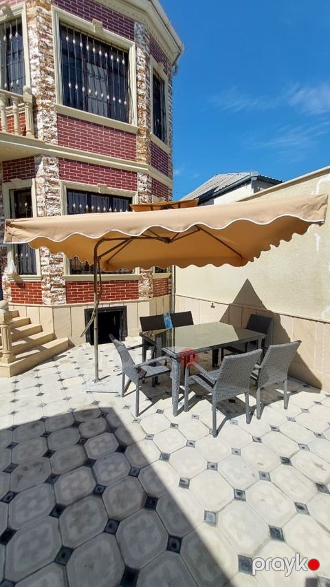 Bağ masa dəsti + böyük bağ çətiri – 700₼. Ünvan — Bakı