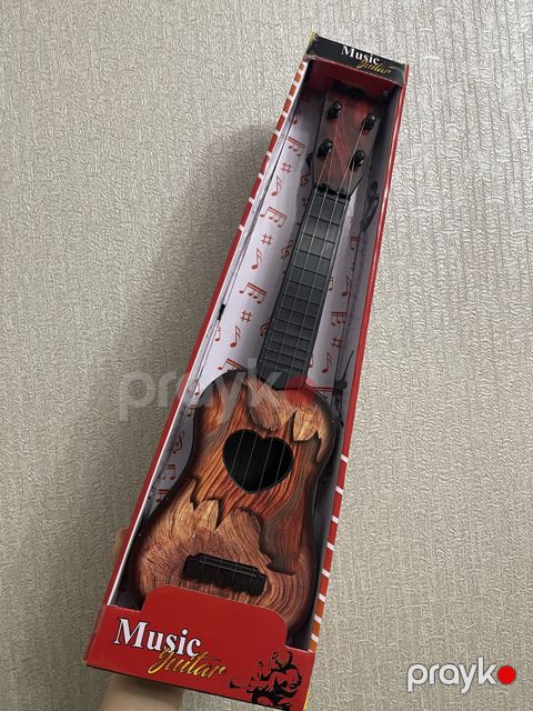 Musiqili oyuncaq gitara 12615_73109342 — Bakı