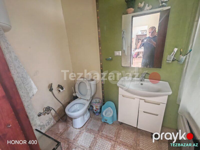 Xaqani Ticarət Mərkəzinin qarşısında — Mənzil, Bakı (9)