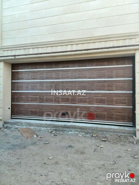 İnterdoor -Avtomatik seksional qapılarin təmiri — İnterdoor
