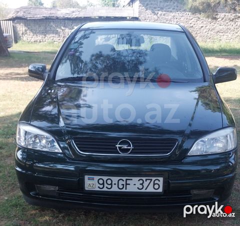 Opel Astra, 1999 — Qax
