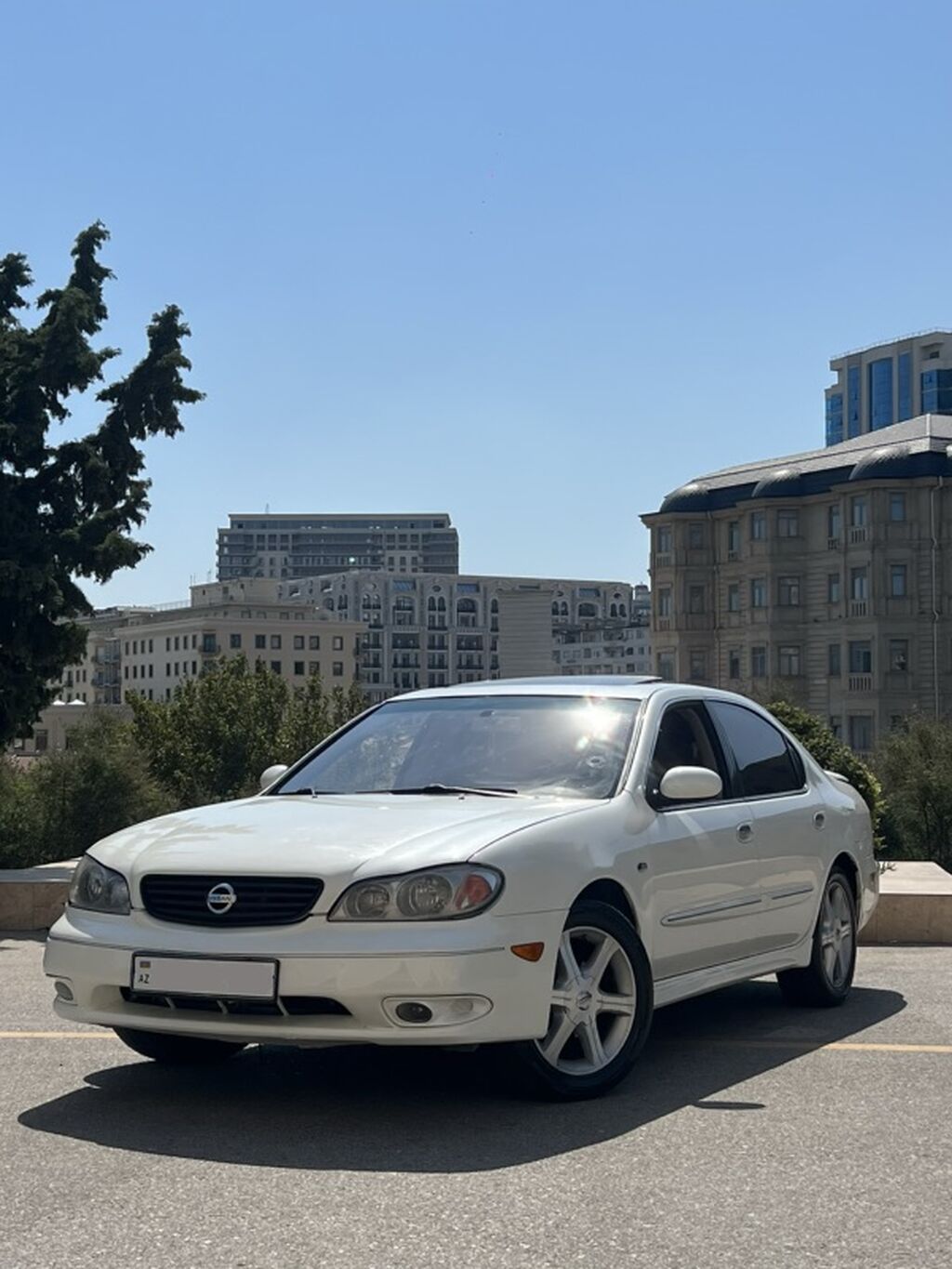 Nissan Maxima QX sedan – ağ rəng, 4 qapı, qabaqdan ötürücülü. Əsas — Avtomobillər, Bakı