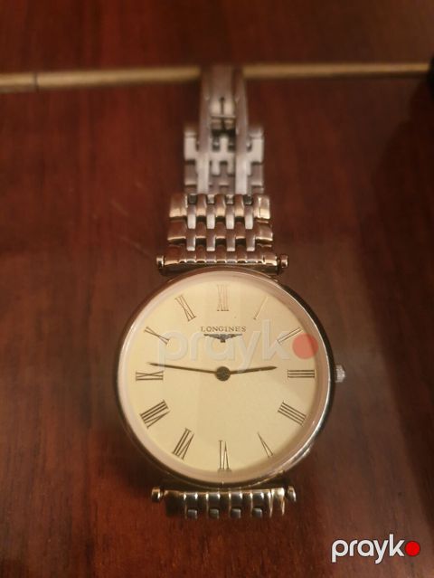 Işlənmiş qızılı rəngdə vaxtı ilə 2000 evroya alınıb Longines — Bakı
