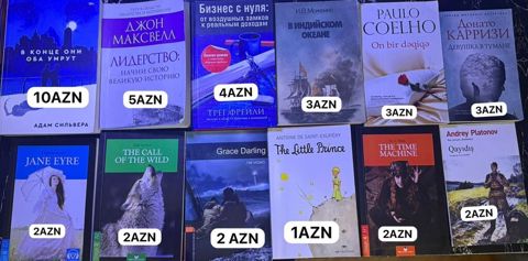 Kitablar dəsti – müxtəlif janrlar və müəlliflər. Hər kitabın üzərində — leyla1317