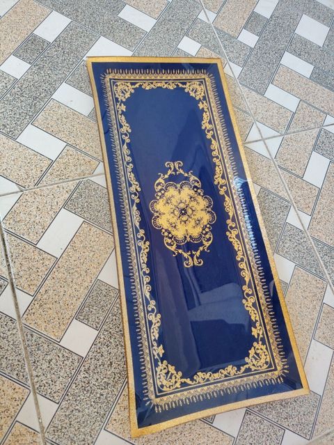 Uzun dekorativ qab — togrul