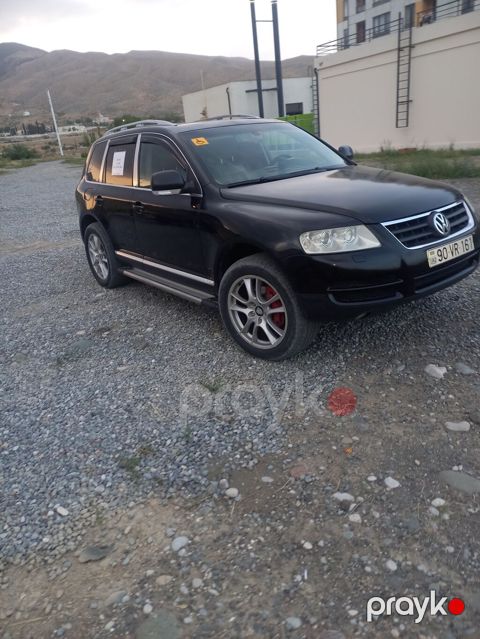 Volkswagen Touareg, qara rəng, 5 qapılı SUV. Özəlliklər: - Güclü — Ağdərə