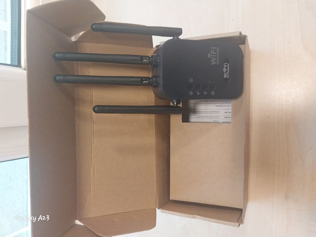 Güclü Wi‑Fi siqnal gücləndirici (WiFi Repeater) Xüsusiyyətlər: - 2.4 — Şəbəkə və server avadanlığı, Digah (4)