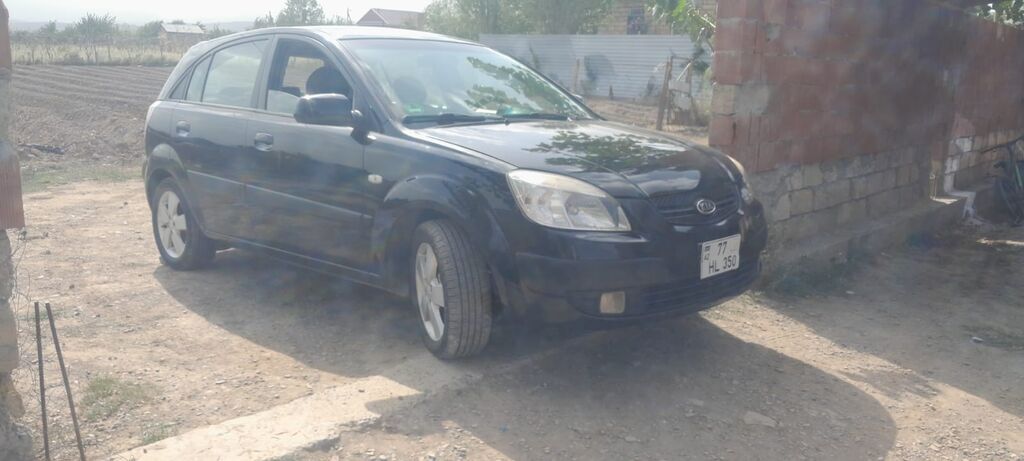Kia Rio: 1.5 l 2006 il Hetçbek 77-HL-350 — Avtomobillər, Bakı