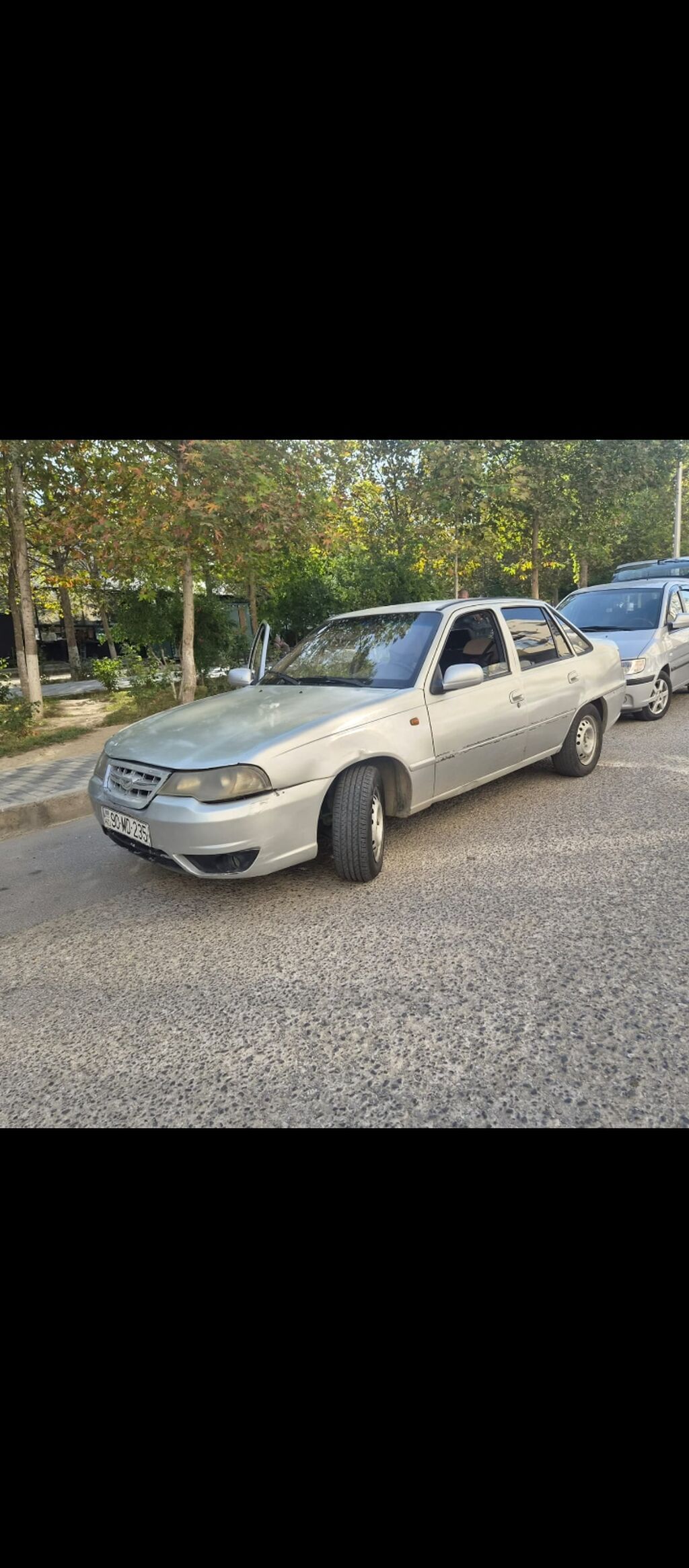 Daewoo Nexia, sedan, gümüşü rəng. - Yanacaq: benzin - Sürətlər qutusu 90-MD-235 — Avtomobillər, Bakı (9)