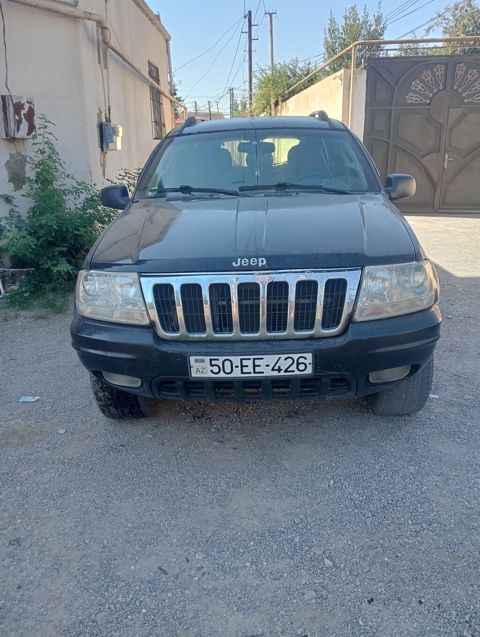 Jeep Grand Cherokee: 2.7 l 2003 il Ofrouder/SUV — Digah