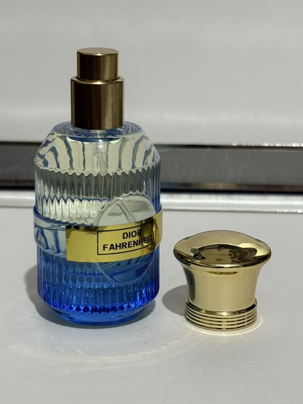 Məhsul: Dior Fahrenheit kişi ətiri (sprey) Təsvir: - Şüşə: Mavi — Ətir, Masazır (3)