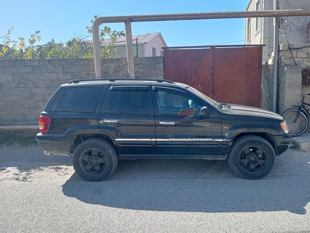 Jeep Grand Cherokee: 2.7 l 2003 il Ofrouder/SUV 50-EE-426 — Avtomobillər, Digah (3)