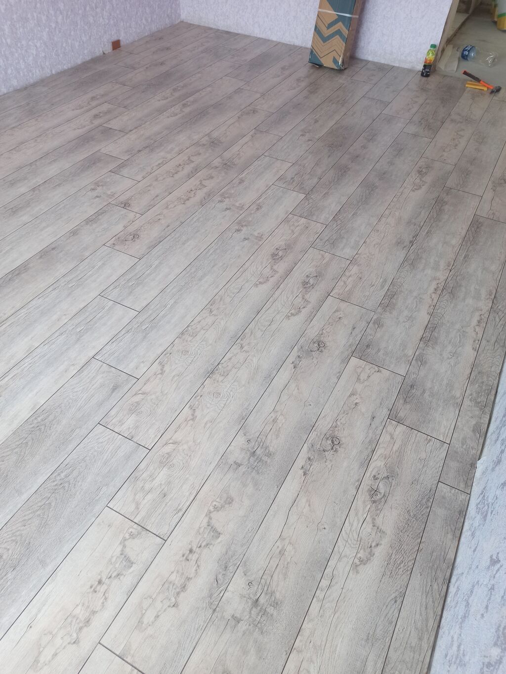 Laminat döşəmə və plitə tipli döşəmə işləri – peşəkar quraşdırma — Döşəmə və tavan işləri, Digah (5)