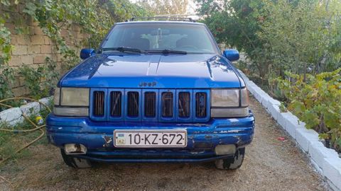 Jeep Grand Cherokee (ZJ) – mavi rəngli, 5 qapılı SUV - Mühərrik: V8 — Bakı
