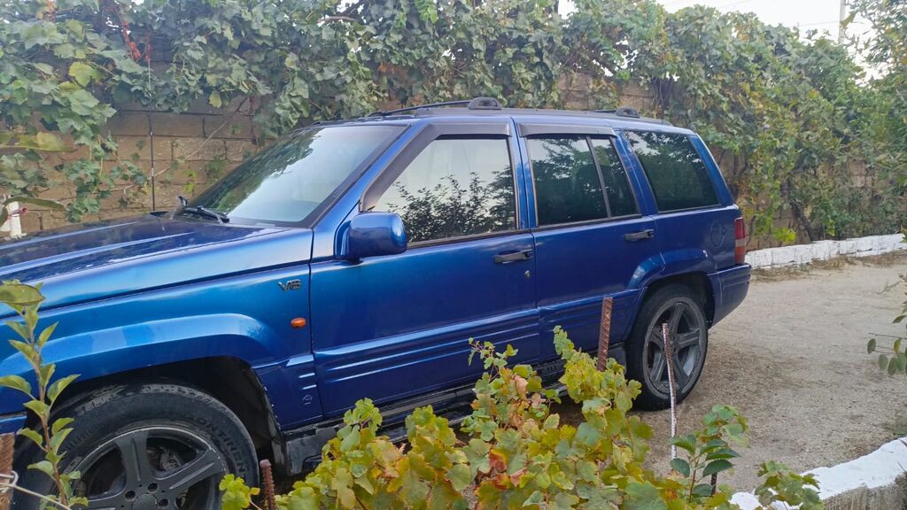 Jeep Grand Cherokee (ZJ) – mavi rəngli, 5 qapılı SUV - Mühərrik: V8 10-KZ-672 — Avtomobillər, Bakı (5)