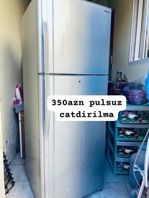Soyuducu – üstdən donduruculu, iki qapılı model. - Rəng: gümüşü (inox — Bakı